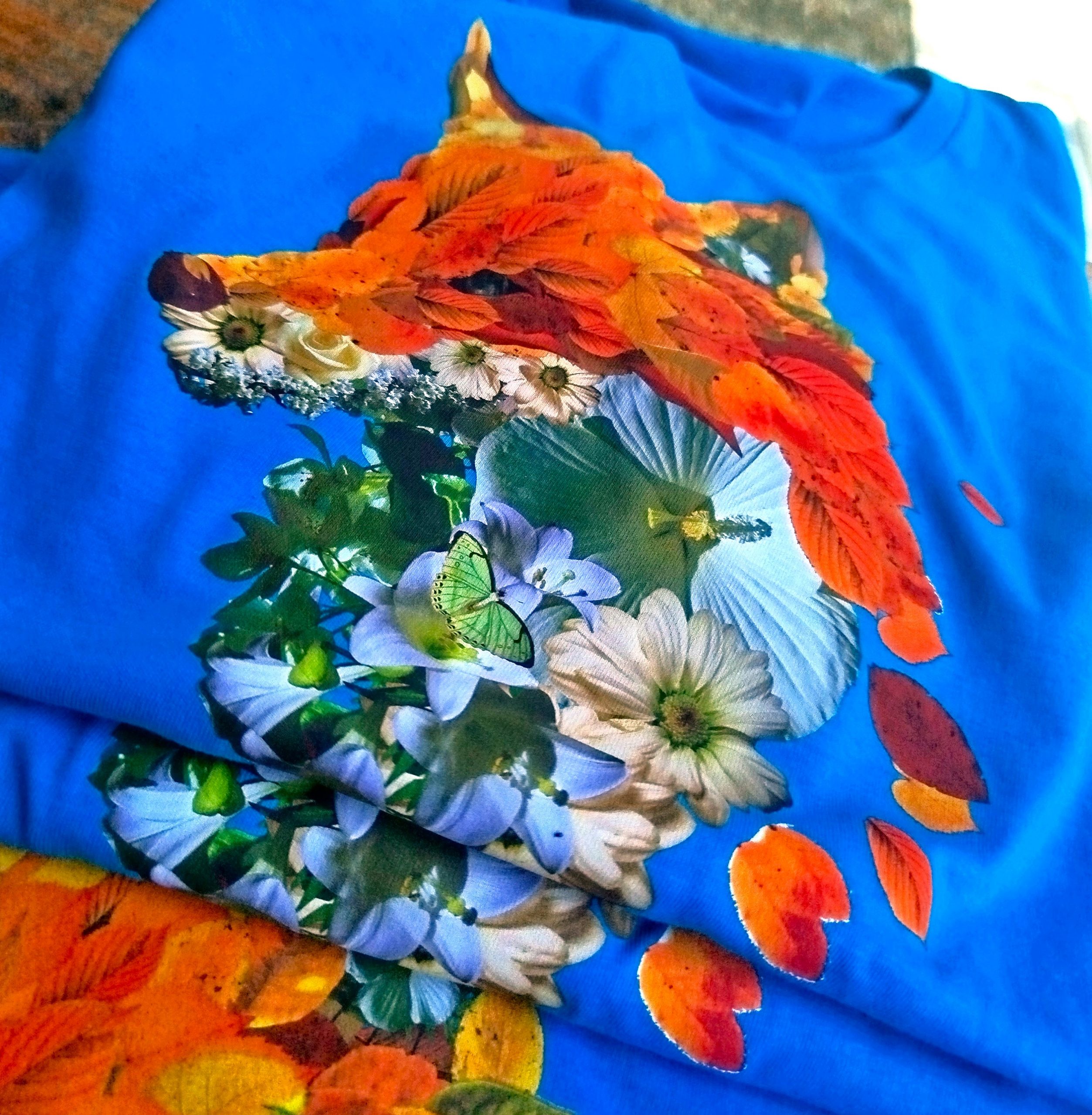 T-shirts 2025 - 34e édition Nuits Atypiques - bleu aqua avec un renard végétal
